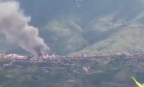 미얀마 친주 탈틀랑 마을의 가옥들이 불타고 있다.