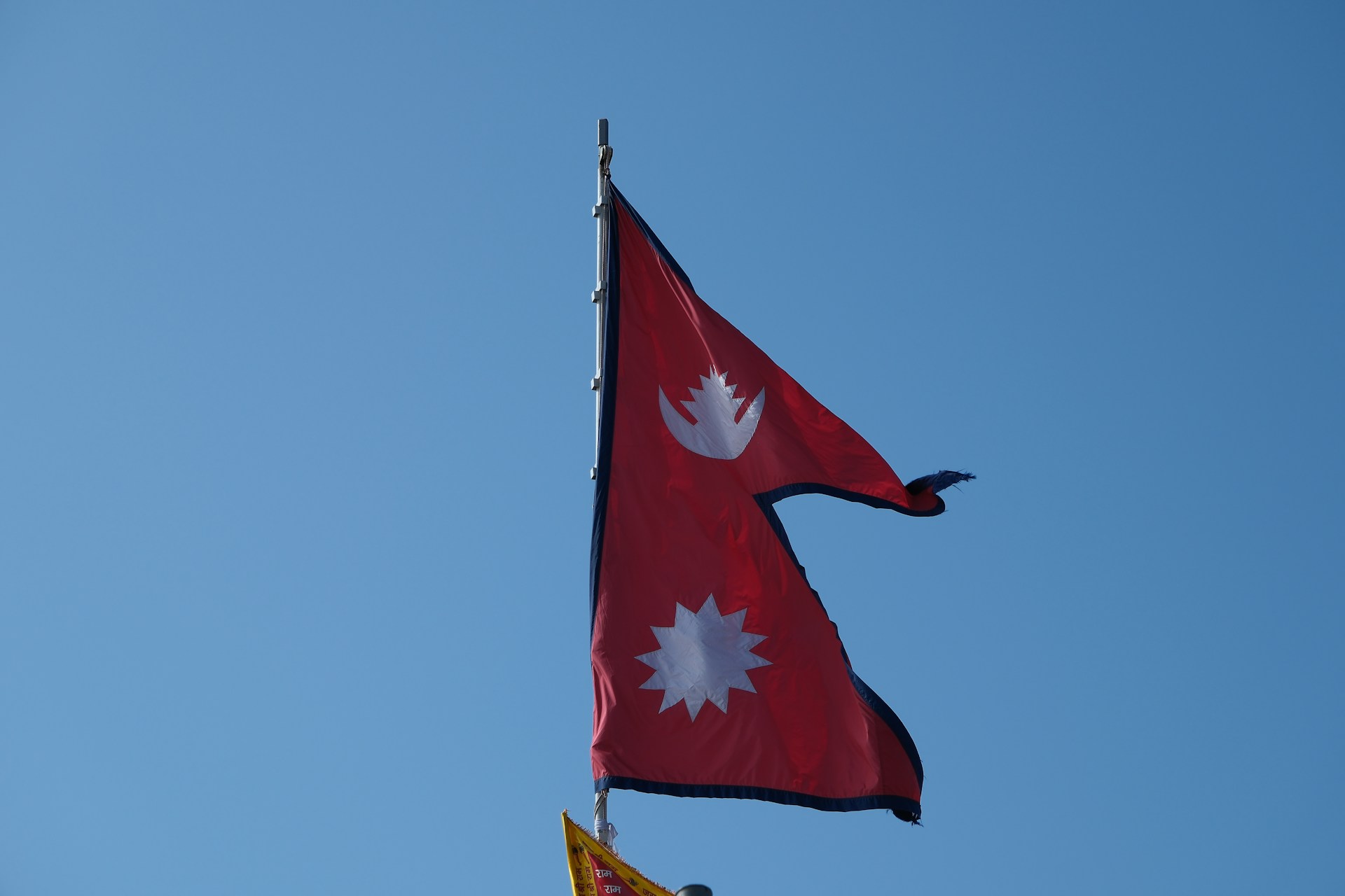 ▲네팔 국기. ⓒUnsplash/Walter Coppola