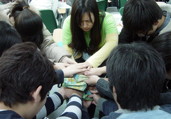 전도에 앞서 기도하는 참가자들 ⓒICM