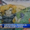 문제가 되고 있는 알코비고등학교 교실 벽에 걸린 그림.