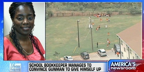 안토니에트 터프(왼쪽) 씨와 무장괴한을 피해 피신 중인 학생들.