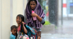 필리핀 세부에서 태풍 하이옌을 피해 이재민 센터로 대피 중인 가족들. ⓒ월드비전 제공