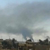 시리아 북동부 텔샤미란 지역에서 이슬람국가(IS)의 공격을 받아 불타고 있는 교회. 